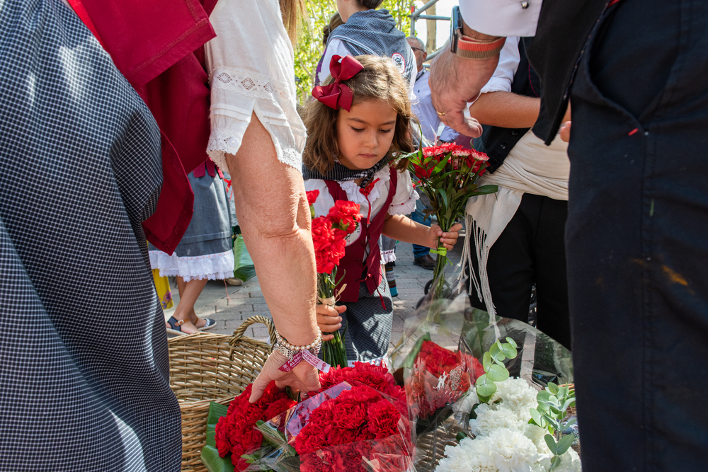La ofrenda llena de devoción y flores el Recinto Ferial  / VÍCTOR FERNÁNDEZ MOLINA