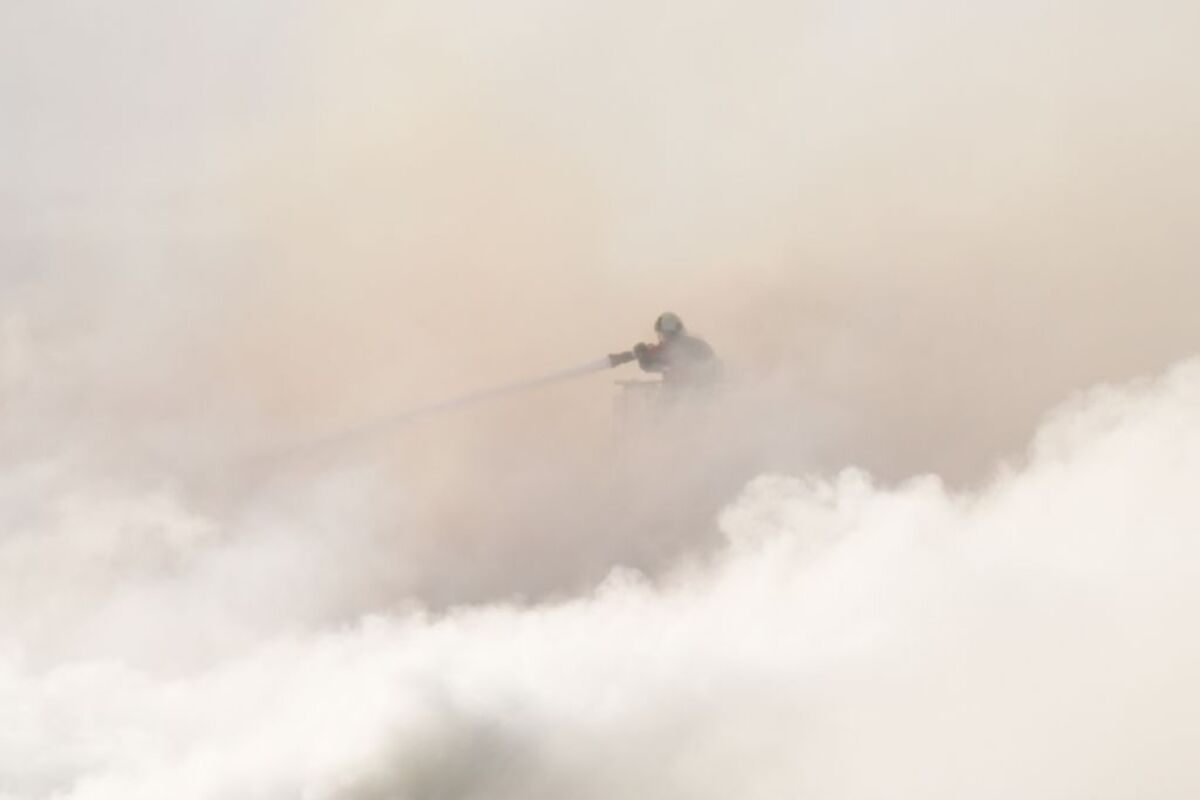 Fire hits historical Stock Exchange building in Copenhagen  / EMIL HELMS